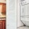 a kitchen with a laundry room attached