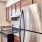 Kitchen with brown cabinets and black appliances