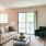 Staged apartment living room with plants